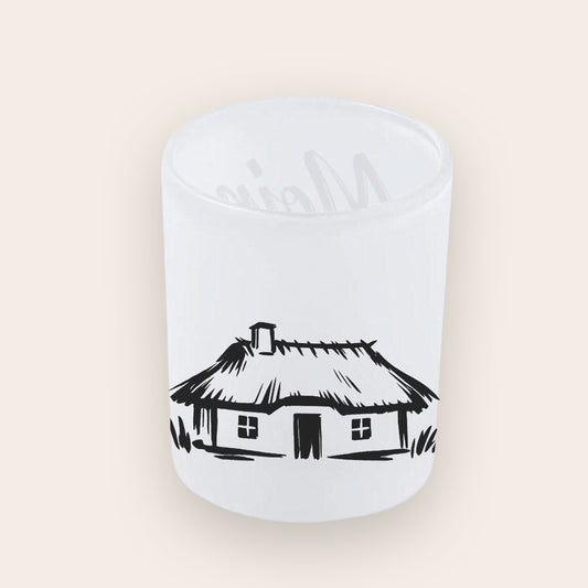 Windlicht aus satiniertem Borosilikatglas mit schwarzem Reetdachkaten-Print.