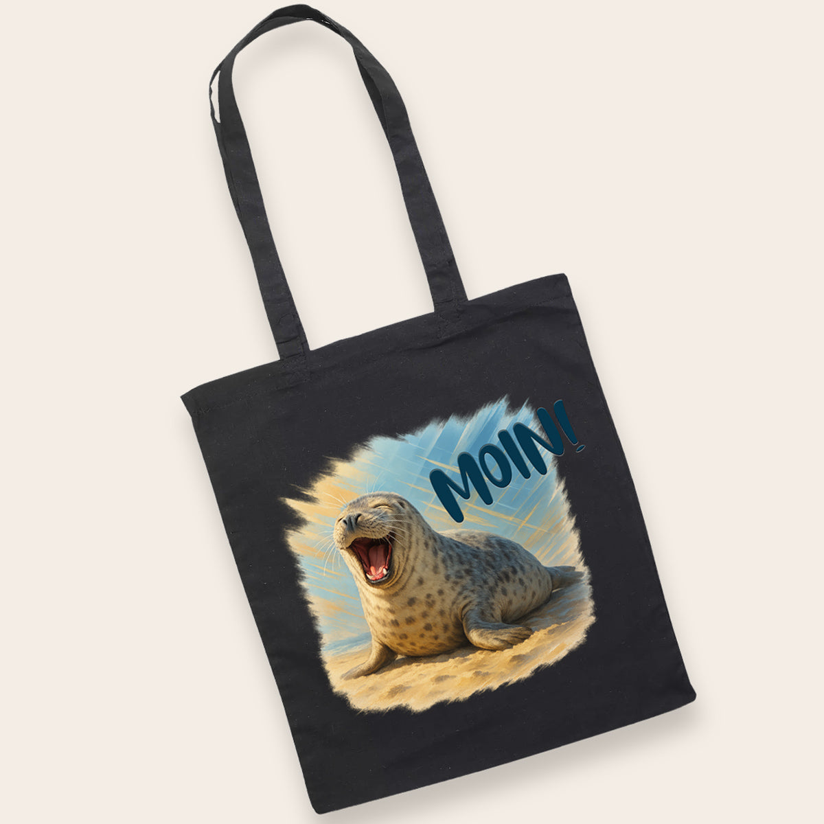 Schwarze Baumwolltasche aus 100% Baumwolle mit einem kontrastreichen Motiv einer fröhlichen Robbe.